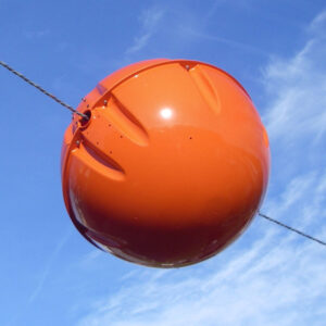 SpanGuard EHV power line marker shown installed on a power line against a blue sky background.