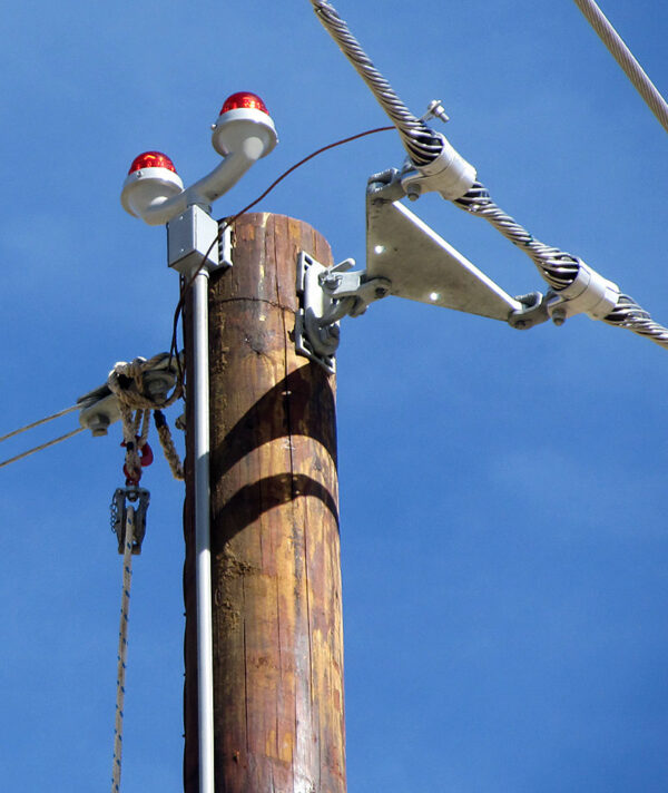 RTO L-810 obstruction light show mounted to a wooden utility pole.