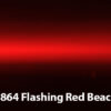 L-864 obstruction light closeup of bright red light being emitted during darkness.